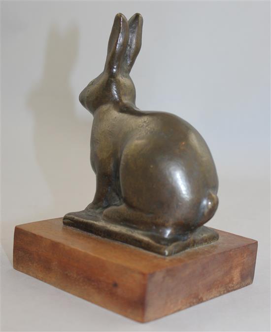 Gunnar Nilsson (Swedish, 1904-1995). A patinated bronze model of a seated hare, 6in.